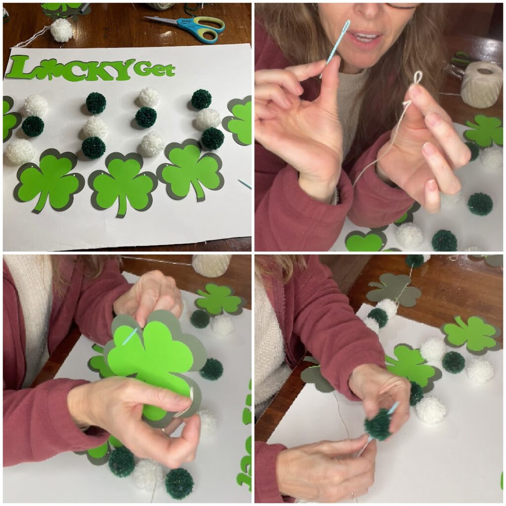 threading string into shamrocks and pom poms to make garland