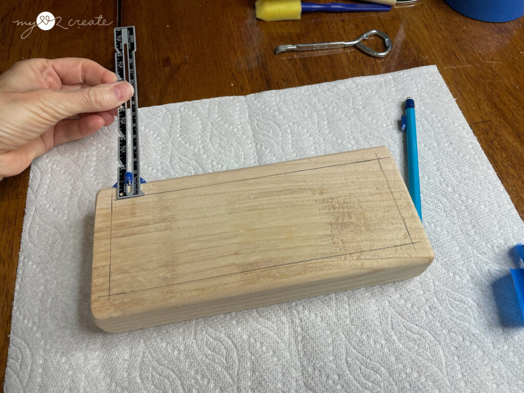 Measuring the wooden block 2x3 before adding the chalk paint