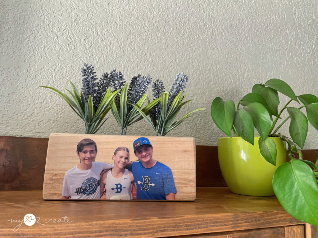 Mod podge image of kids on a 2x4 wooden block